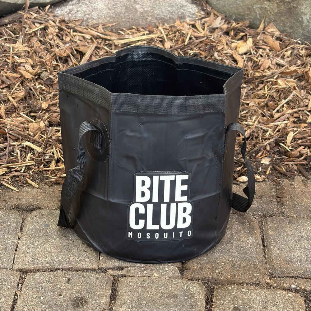 A Bite Club Mosquito container set out on a patio